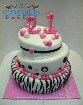 pink topsy turvy 21st cake