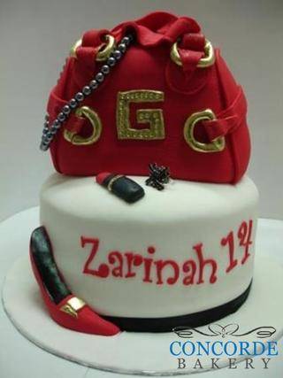 red gucci handbag cake